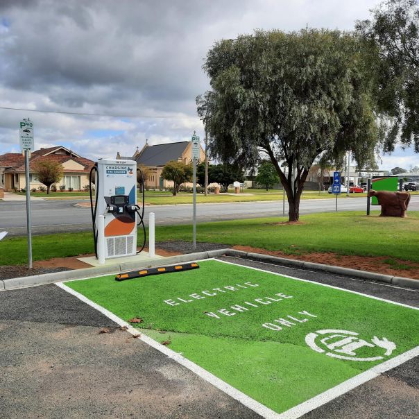 Photo of a vacant car park with an electric vehicle charging station